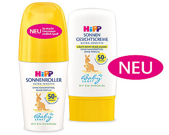 Zwei Sonnenschutzmittel der Marke "HiPP", eines als Roll-on und eines als Creme, beide mit einem hohen Lichtschutzfaktor von 50+ und mit der Kennzeichnung "Baby Safe".